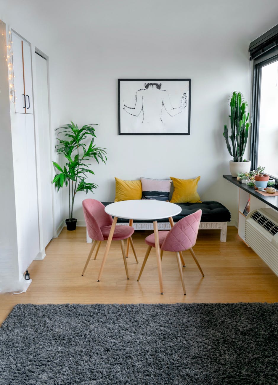 contemporary room interior with furniture and carpet on floor