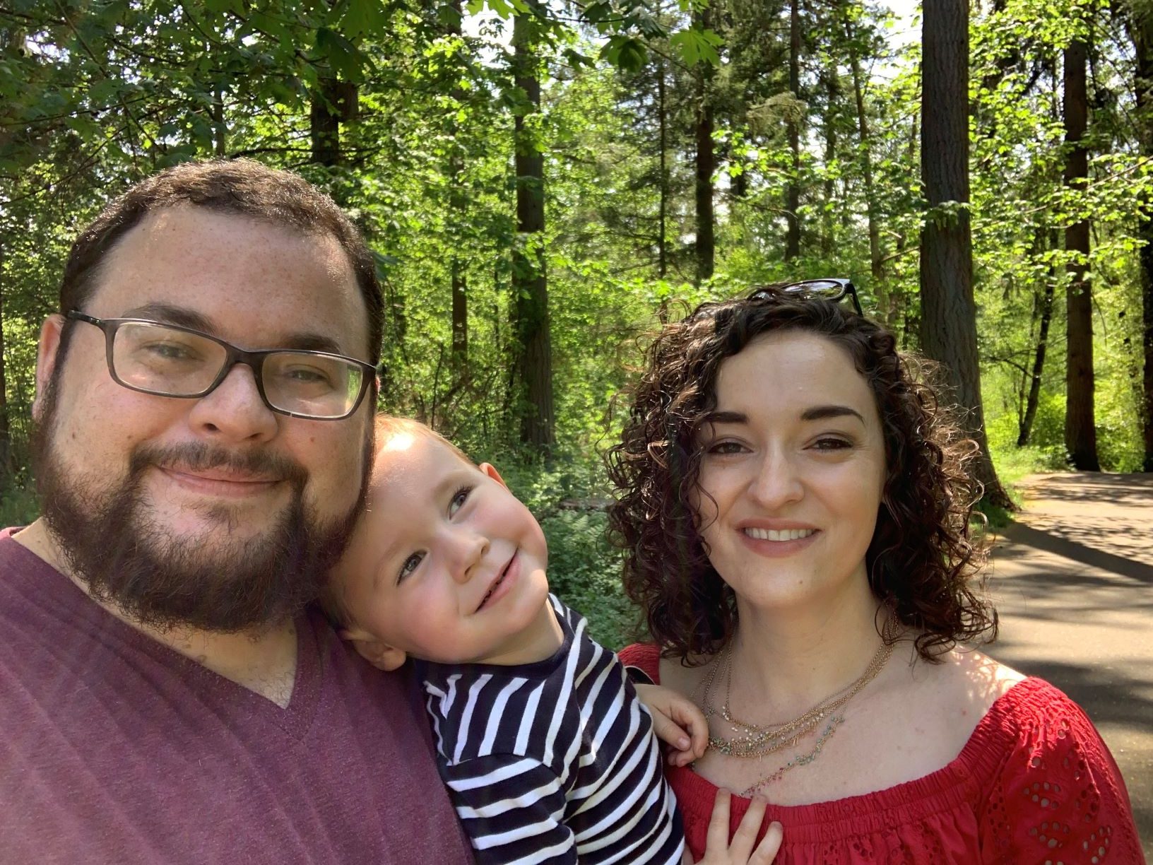 A family oh a hike in the woods