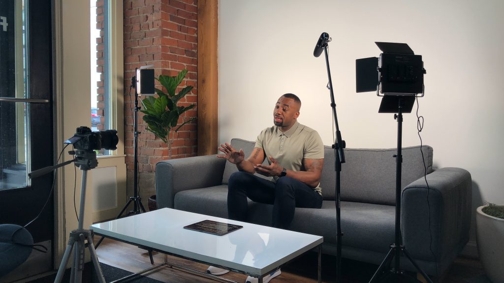 real estate agent talking on couch