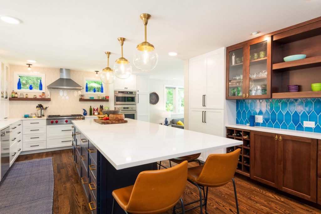 A renovated kitchen with tile backsplash