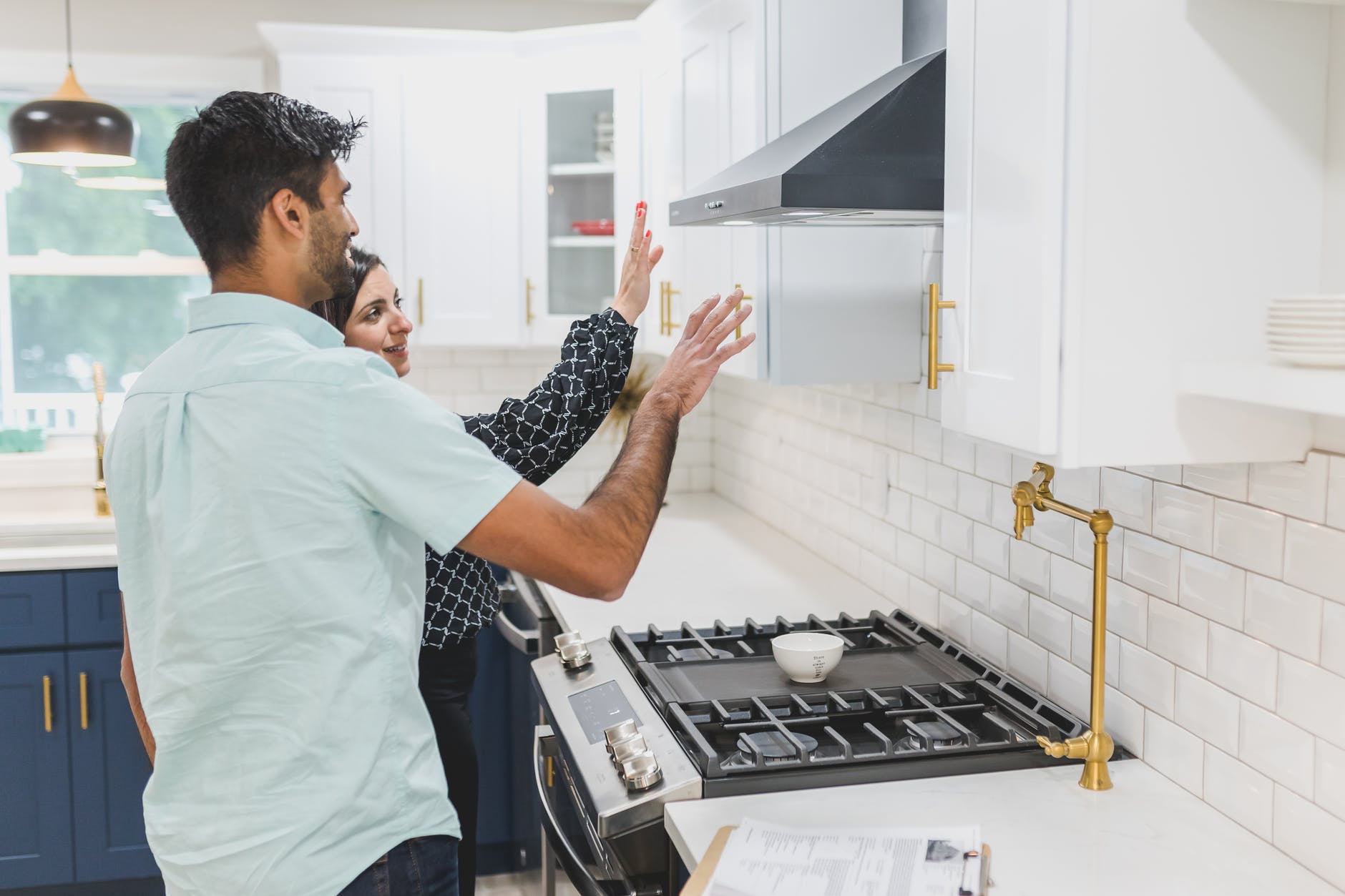 a real estate agent giving a client a house tour