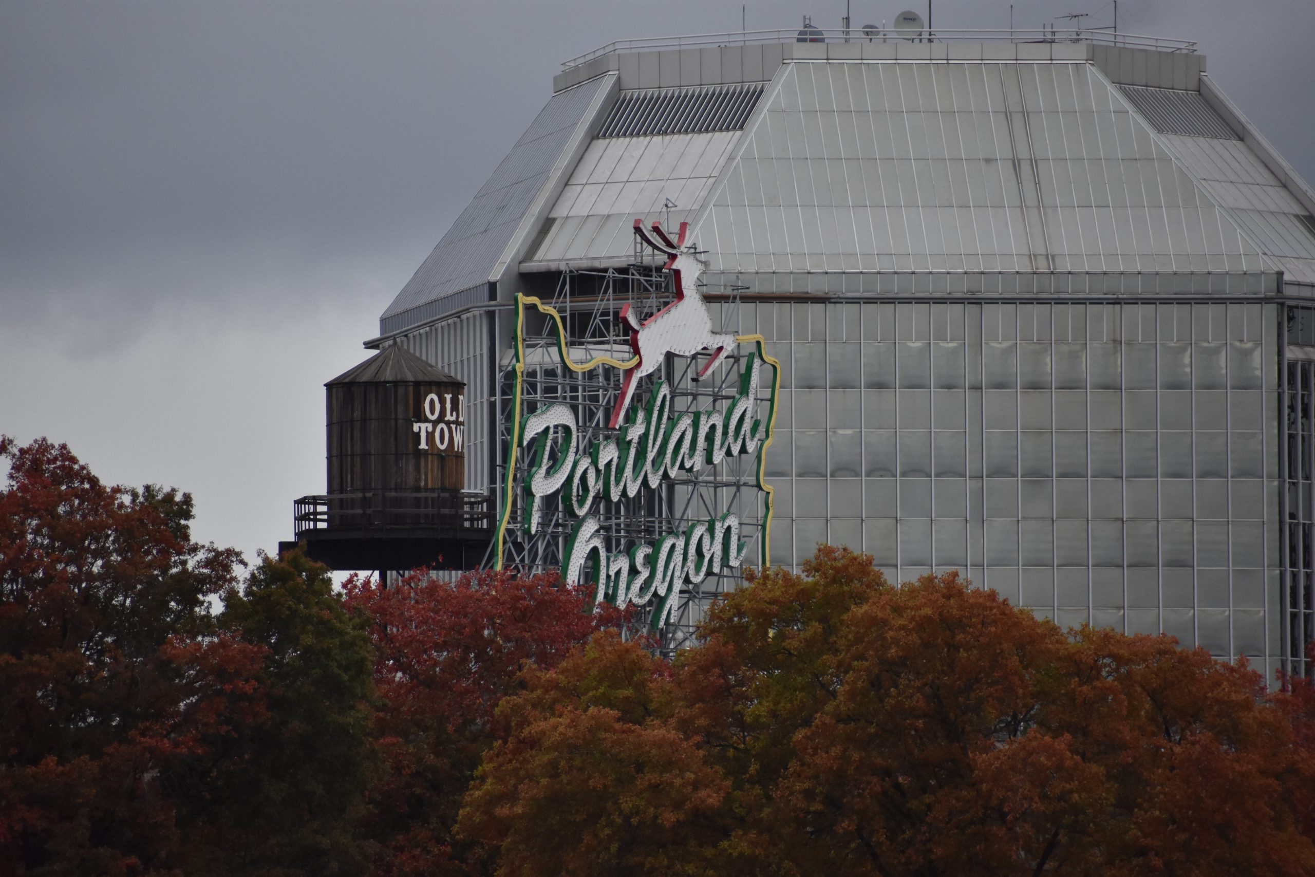 Portland 'White Stag' sign with Old Town water tower