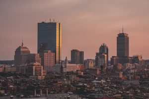 aerial view of city under cloudy sky during daytime